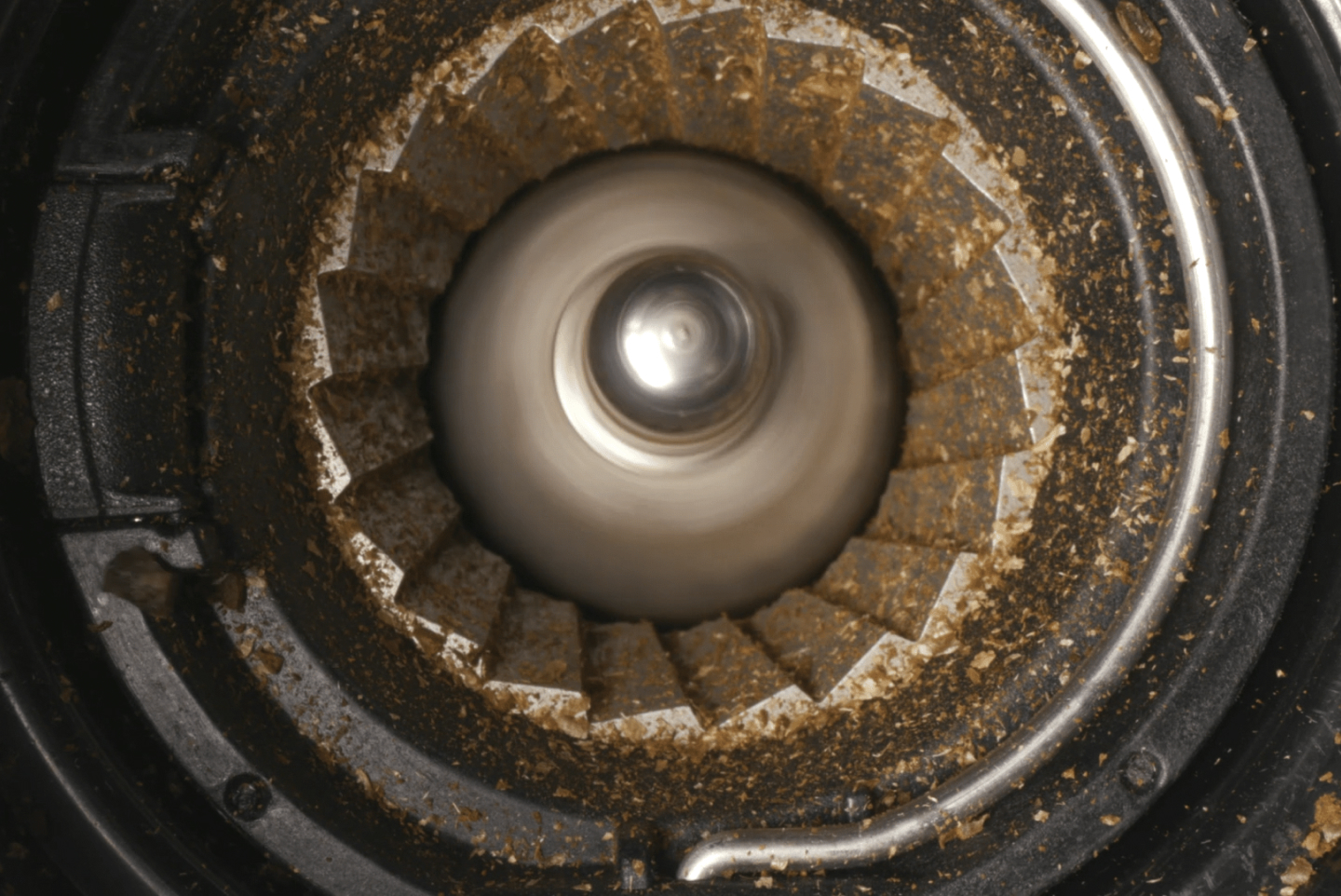 Close-up of a burr coffee grinder Close-up of a burr coffee grinder